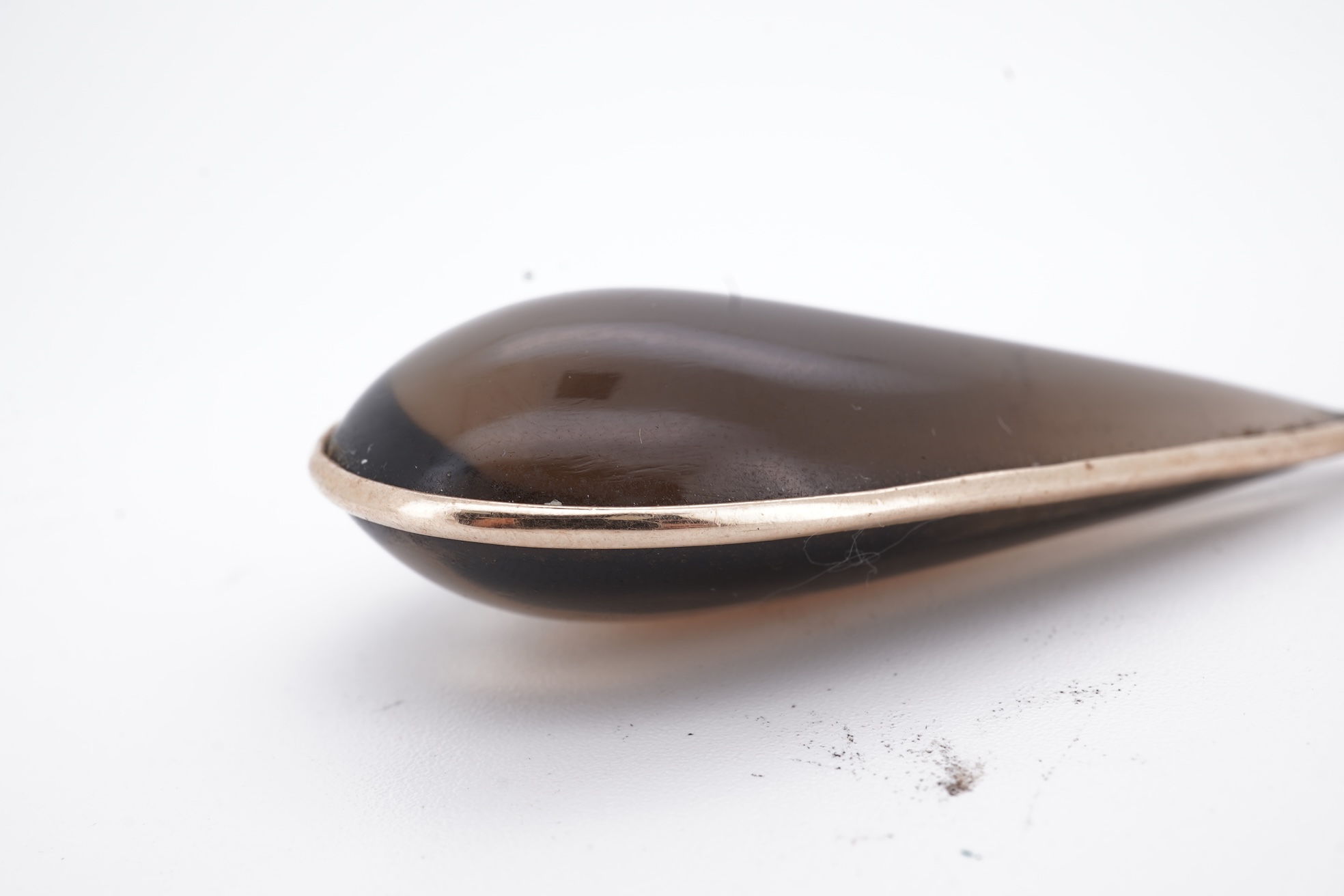 A yellow metal mounted pear shaped smoky quartz set drop pendant, overall 59mm.